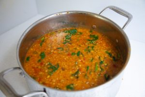 Pot filled with vegan dhal recipe