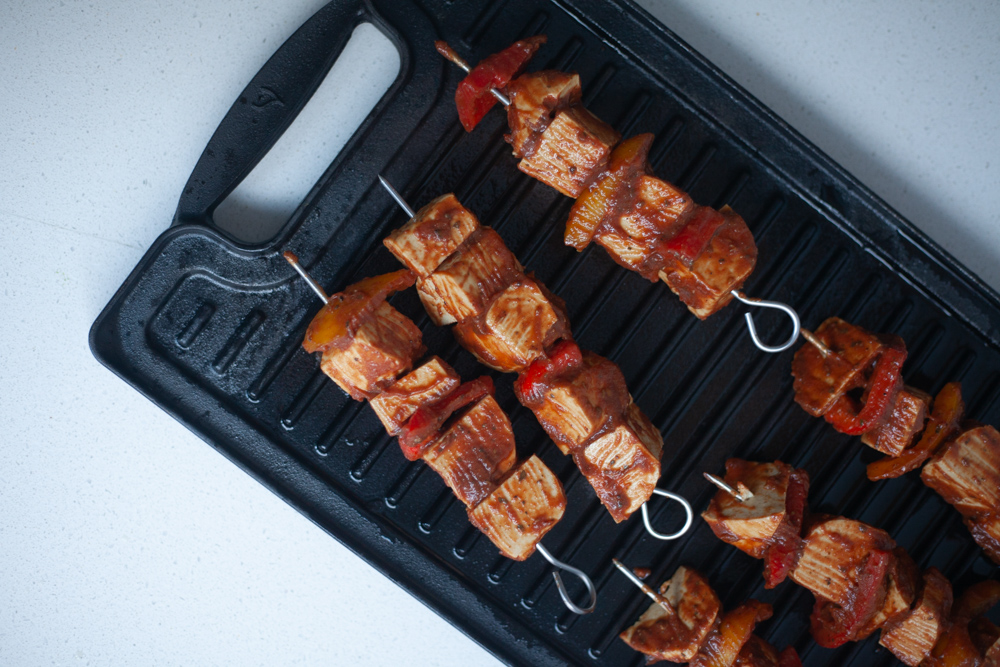 Tofu skewers on a cast iron grill pan