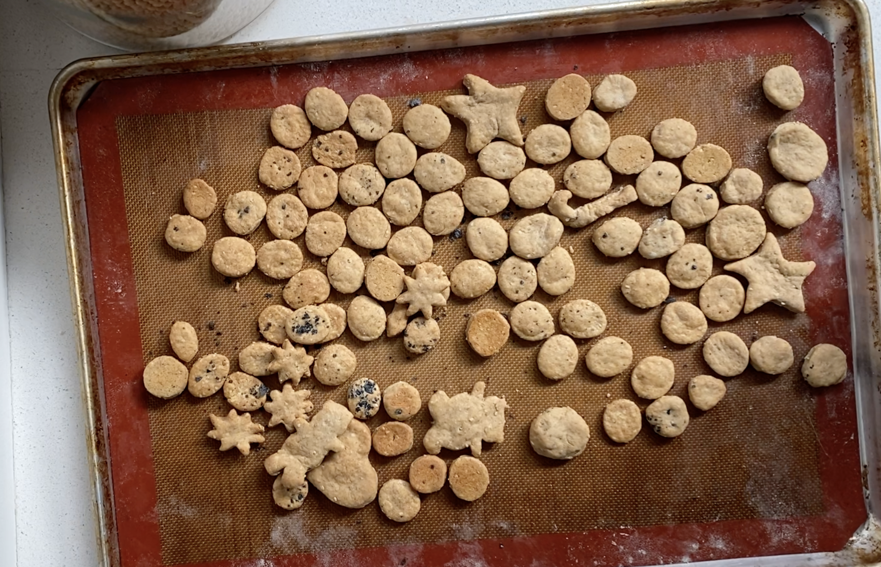 Baking sheet with crackers on top